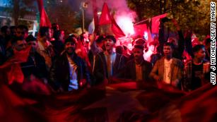 Supporters of Turkish President Recep Tayyip Erdogan celebrate at the AK Party headquarters on May 14, 2023 in Istanbul, Turkey. Photo by Jeff J Mitchell/Getty Images.