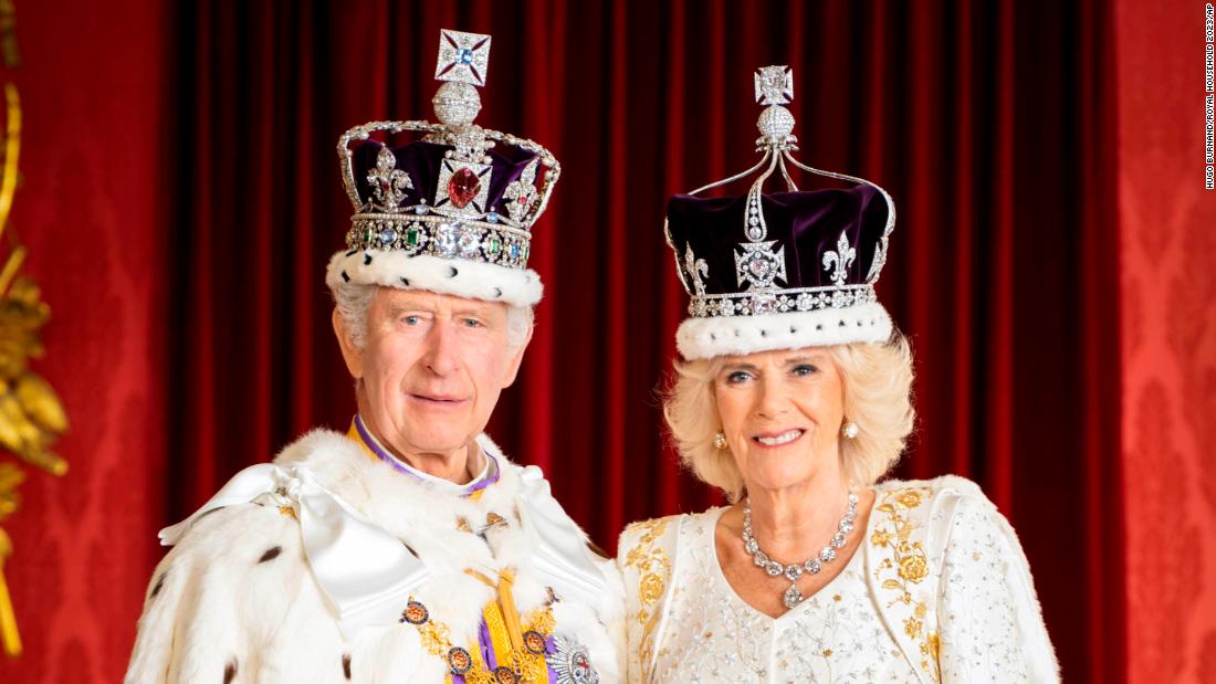 The King and Queen pose for a portrait in Buckingham Palace.