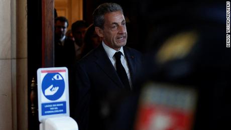 Nicolas Sarkozy leaves the Paris Court of Appeals in Paris after hearing the ruling on May 17, 2023.  