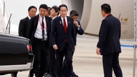 Japanese Prime Minister Fumio Kishida arrives at Hiroshima airport to attend the G7 leaders&#39; summit in Hiroshima, Japan, on Thursday.