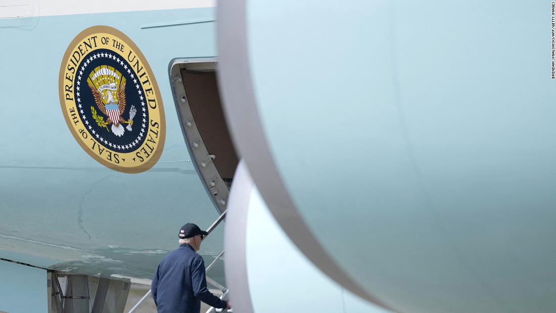 Biden boards Air Force One during after a stop for refueling at Elmendorf Air Force Base in Anchorage, Alaska, on May 17. 