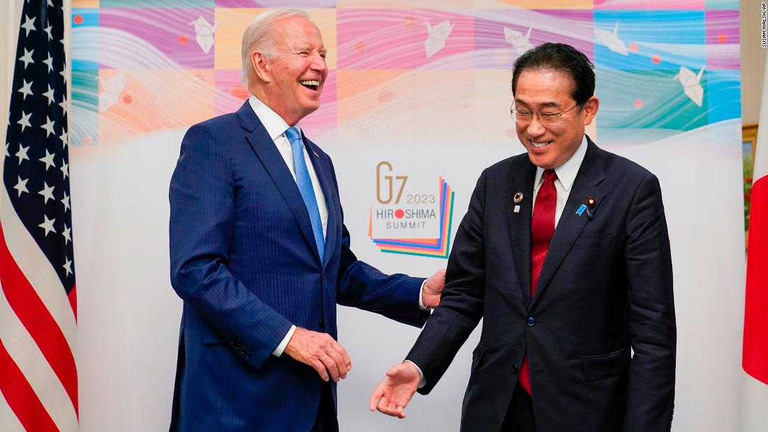 Biden and Kishida laugh together in Hiroshima on May 18.