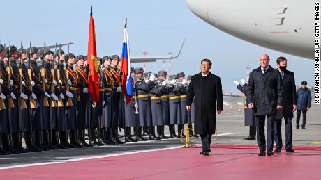 Chinese leader Xi Jinping inspects the honor guard at the Moscow Vnukovo Airport on March 20, 2023. 
