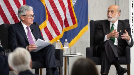 Federal Reserve Board Chair Jerome Powell and former Federal Reserve Board Chair Ben Bernanke (R) participate in a discussion at the Federal Reserve Board building in Washington, DC, May 19, 2023.