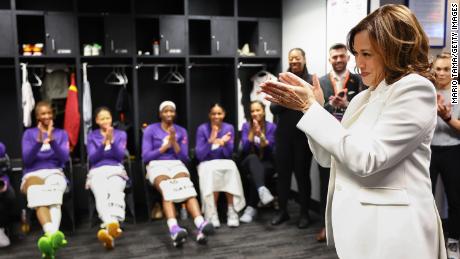 Harris addressed the players in their locker room before the game.
