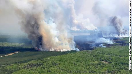 The Eagle Wildfire burns near Fox Creek, Alberta, on Saturday, May 13, 2023.