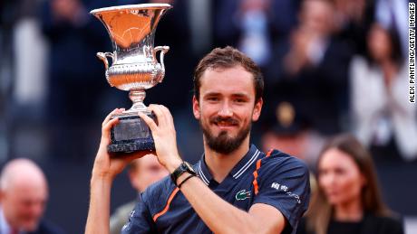 Medvedev lifts the Italian Open trophy after defeating Rune. 