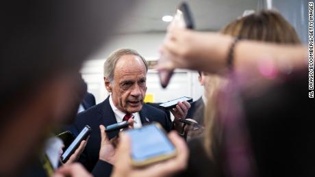 Sen. Tom Carper, a Democrat from Delaware, speaks to members of the media while arriving for a vote in the basement of the Capitol in Washington, DC, in 2021.