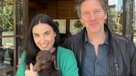 A photo shared by Andrew McCarthy of a visit he had with his former costar, Demi Moore.