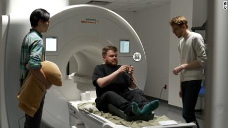 Before entering the fMRI machine, CNN correspondent Donie O&#39;Sullivan was given specialized earphones to listen to an audiobook during his brain scan.