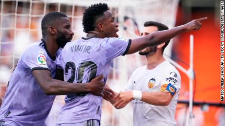 Vinícius Jr. points to a fan in the stand who allegedly racially abused him during Real Madrid&#39;s match at Valencia.
