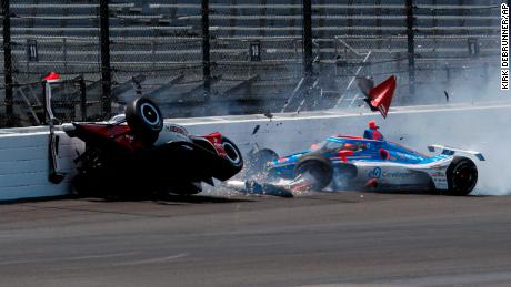 Legge and Stefan Wilson crash in the first turn during practice for the Indianapolis 500.