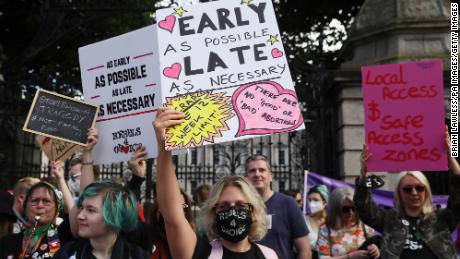 People attend an abortion rights protest outside Leinster House, Dublin, on September 25, 2021.