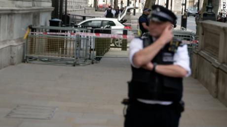 Police investigate at the site of an incident involving a vehicle at Downing Street in London on May 25. 