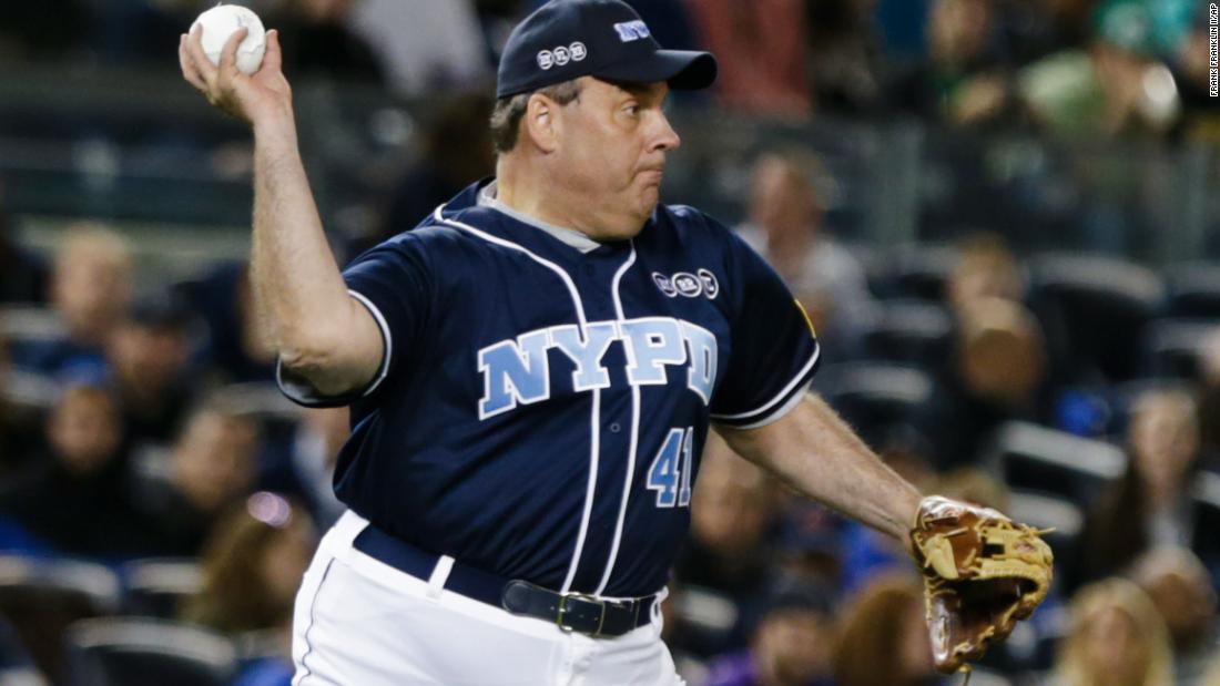 Christie throws to first base during the &quot;True Blue&quot; celebrity softball game held at New York&#39;s Yankee Stadium in 2015. The charity event raised money to support the families of fallen New York police officers.