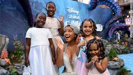 LONDON, ENGLAND - MAY 15: Halle Bailey with young fans at the UK Premiere of Disney&#39;s &quot;The Little Mermaid&quot; on May 15, 2023 in London, England. (Photo by Kate Green/Getty Images for Disney)