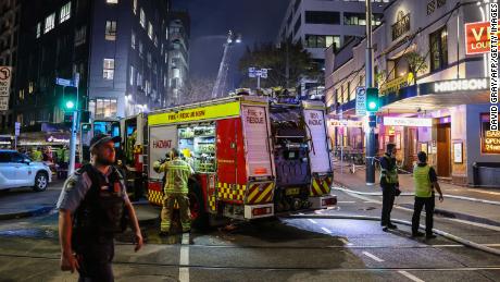 Firemen at the scene of a fire at a building in Sydney on May 25. 