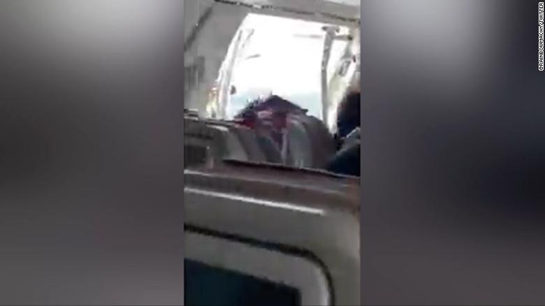 Passenger opens plane emergency exit midair