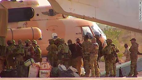 Russian mercenaries boarding a helicopter in northern Mali. 
