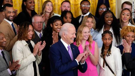 President Joe Biden claps as the 2023 NCAA national champion LSU women&#39;s basketball team is recognized during an event to honor the team in the East Room of the White House, May 26, 2023, in Washington, DC. 