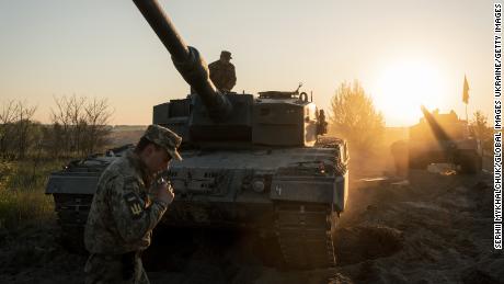 Ukrainian troops are seen training on German Leopard 2 tanks on May 14 in Ukraine.