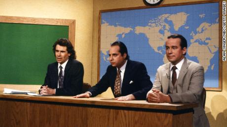 (From left) Dennis Miller, Jon Lovitz and Phil Hartman during the &#39;Weekend Update&#39; segment on &quot;Saturday Night Live&quot; in December 1986.