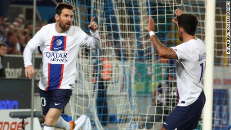 Lionel Messi celebrates his record-breaking goal.