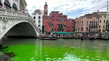 Video shows Venice's iconic canal turned fluorescent green 