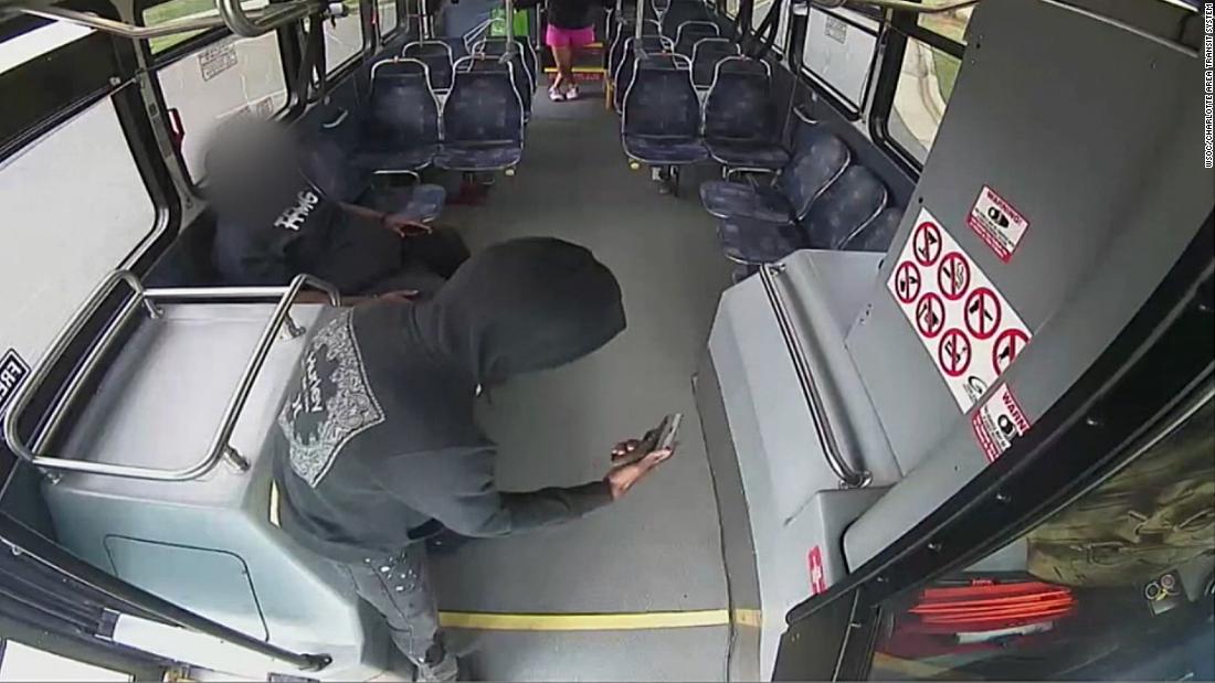A bus driver and passenger opened fire on each other on a moving Charlotte transit bus, leaving both injured