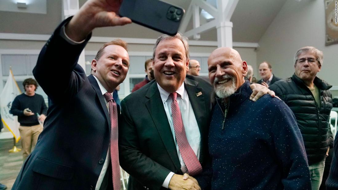 Christie poses for a selfie after a town hall-style meeting in Henniker, New Hampshire, in April 2023.
