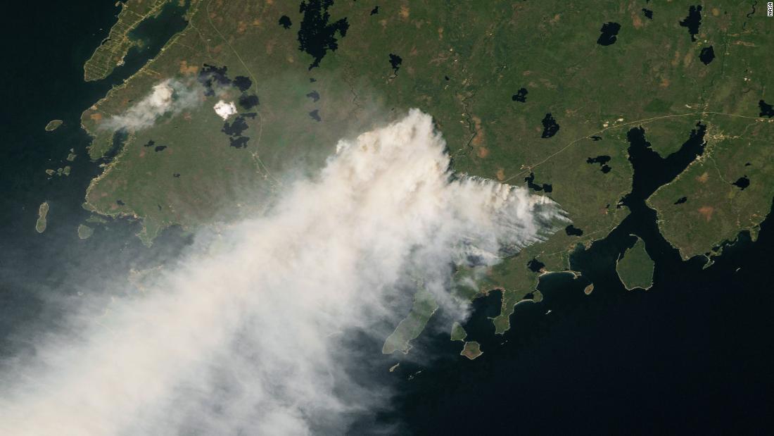 An astronaut aboard the International Space Station took this photo of wildfire smoke near Shelburne, Nova Scotia, on May 29. Human-caused climate change has exacerbated the hot and dry conditions that allow wildfires to ignite and grow.