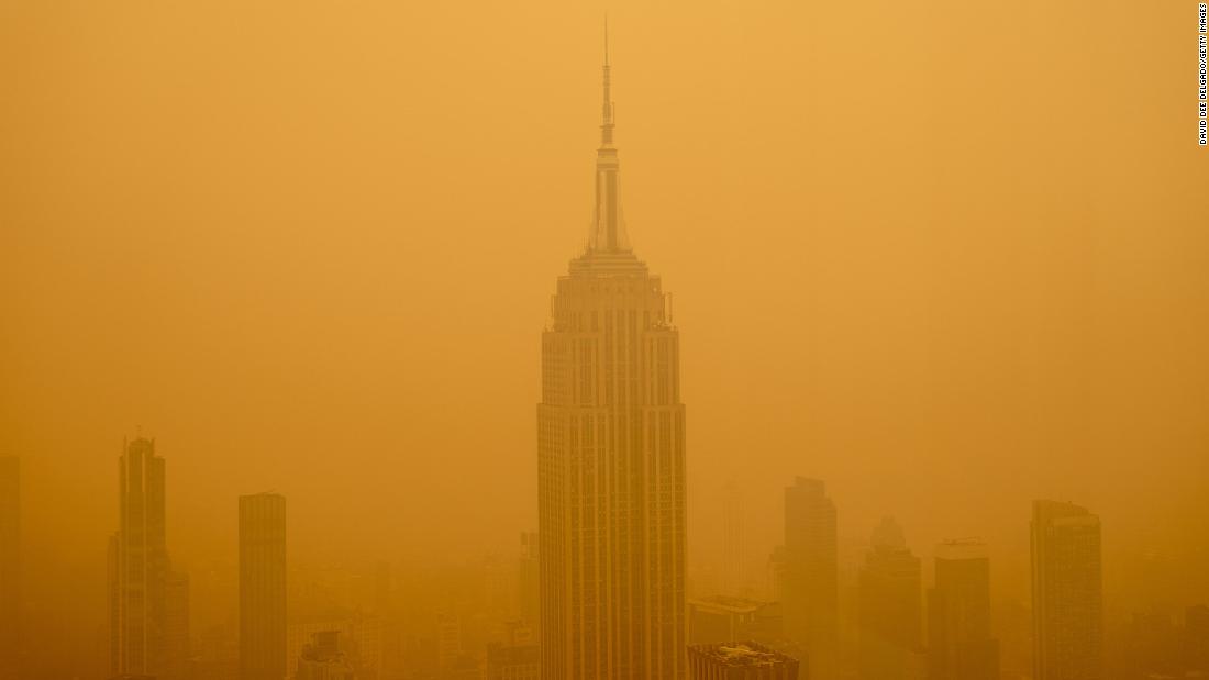 Smoky haze affects the visibility of the Empire State Building in New York on June 7.