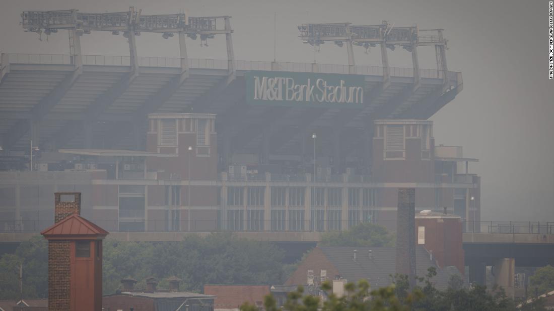 A smoky haze obscures M&amp;amp;T Bank Stadium in Baltimore on June 8.