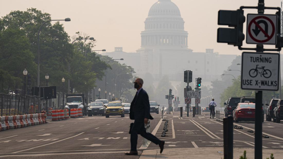 NextImg:Air quality over the US and Canada is improving after extreme wildfire conditions. But the smoke and altered skies will take time to clear