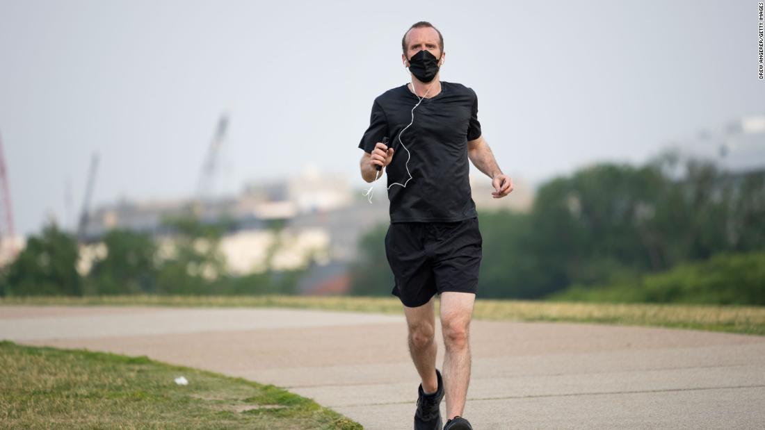 A jogger wears a face mask in Washington, DC, on June 9.