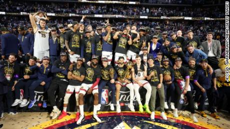 The Denver Nuggets celebrate after beating the Miami Heat in the NBA Finals.