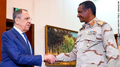 Russian Foreign Minister Sergey Lavrov, left, and  General Mohamed Hamdan Dagalo (Hemedti) hold a meeting in Khartoum, Sudan, on Feb. 9, 2023, two months before the conflict broke out.  