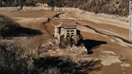 The monastery of San Salvador de la Vedella, accessible by foot due to the low water levels in Cercs, Catalonia, in Spain on February 10, 2022.
