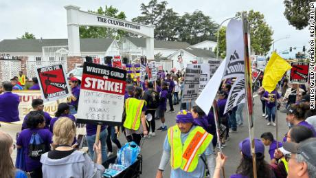 Janitors from SEIU United Service Workers West and Writer&#39;s Guild of America strikers join together at The Culver Studios picket in Culver City, California on June 15, 2023.
