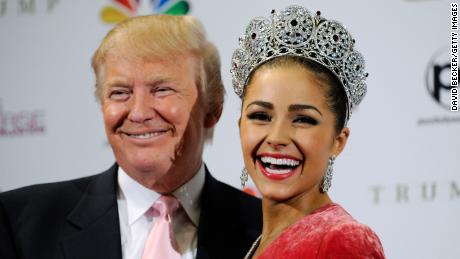 Donald Trump poses with Miss USA 2012, Olivia Culpo, at a news conference after she was named the new Miss Universe during the 2012 Miss Universe Pageant at PH Live at Planet Hollywood Resort &amp; Casino on December 19, 2012, in Las Vegas, Nevada.