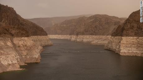 Bathtub rings, showing how far the water level has dropped, are seen along the banks of Lake Mead near the Hoover Dam in April 2023.