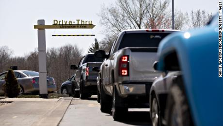 Customers wait in the drive-thru at a McDonald&#39;s restaurant in Peru, Illinois, in April 2020. 
