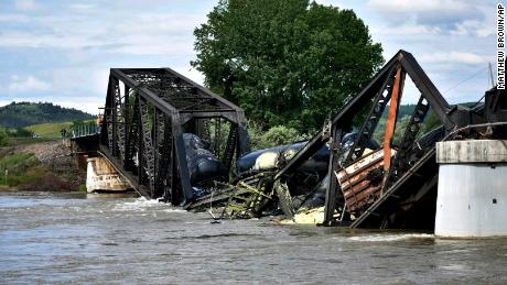 Several train cars fell in the Yellowstone River near Columbus, Montana, on June 24, 2023.