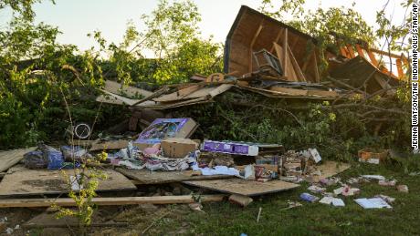 Debris is left behind after a reported tornado touched down in several areas of Greenwood, Indiana, near Bargersville, Sunday.