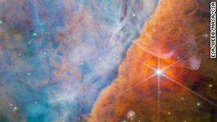 Webb Telescope captures infant protostar at the centre of a cosmic  hourglass - BBC Sky at Night Magazine