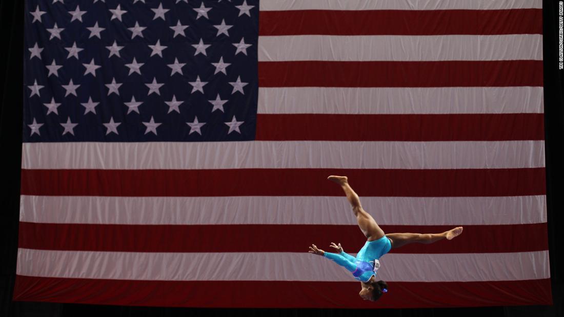 Biles competes on the balance beam during the US National Gymnastics Championships in August 2013. She won gold in the individual all-around.