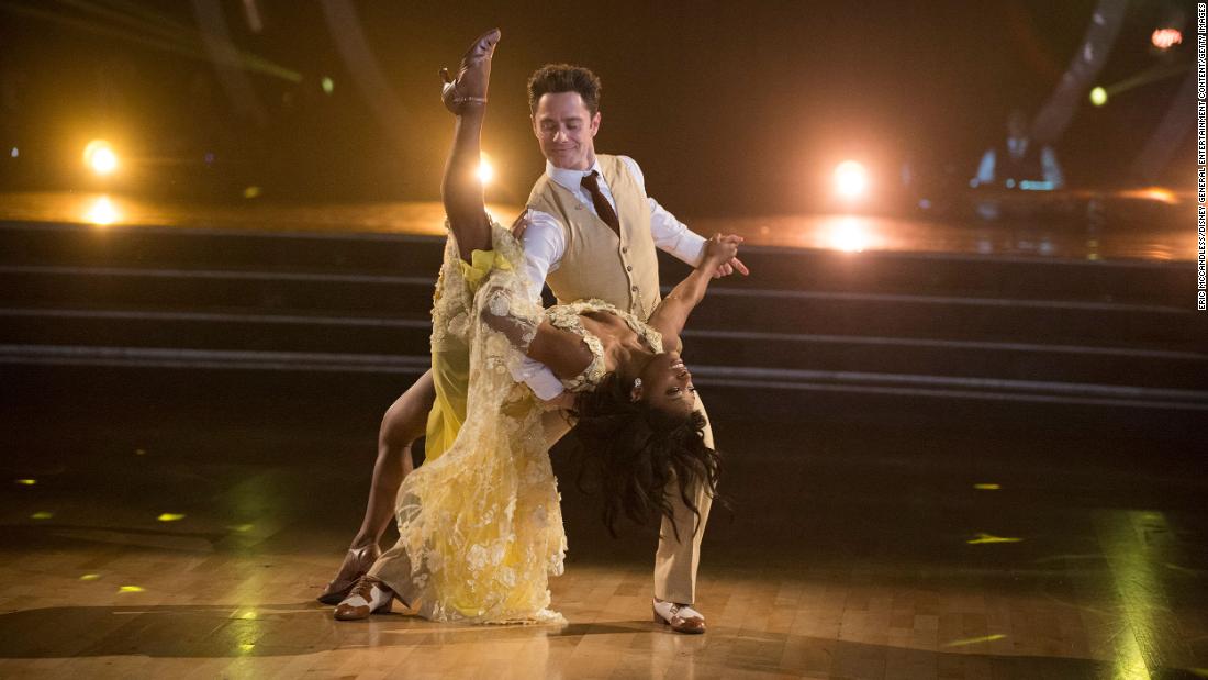 Biles competes in &quot;Dancing with the Stars&quot; with Sasha Farber in 2017. They would finish in fourth place.