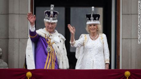 King Charles III and Queen Camilla are seen on the Buckingham Palace balcony on May 06, 2023 in London, England.