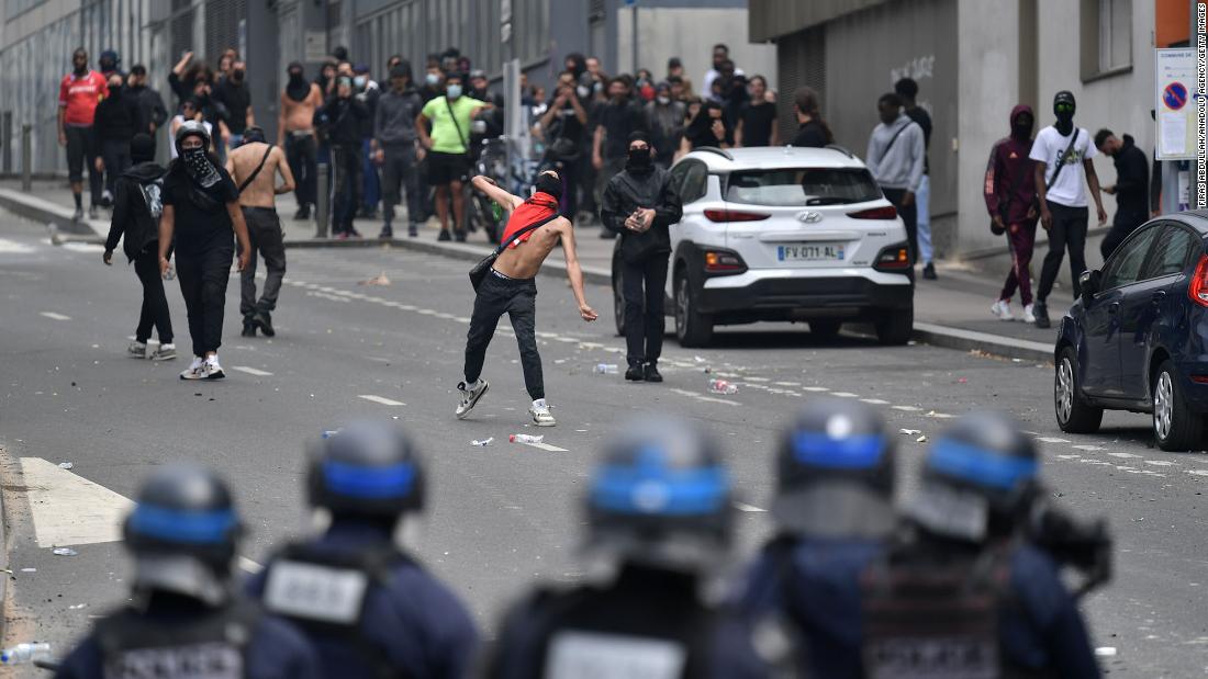 Demonstrators clash with police in Paris on June 29.