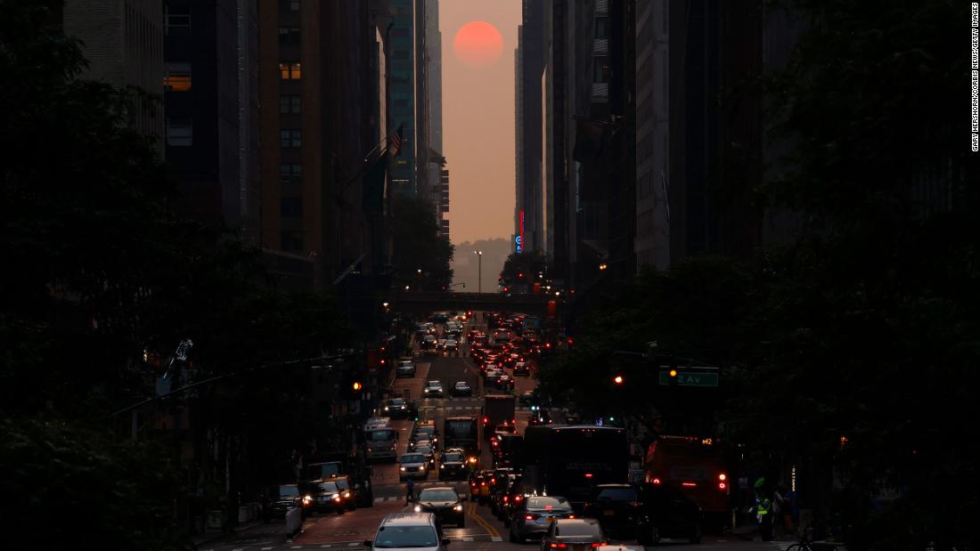 The setting sun is shrouded by smoke from Canadian wildfires in this photo taken from New York&#39;s 42nd Street on Thursday, June 29.